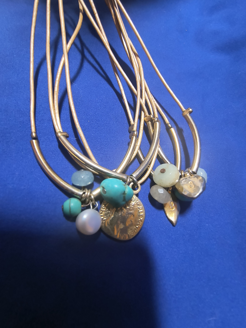 Sea Gold-Tone Layered Necklace with Turquoise, Aqua and Pearl Charms